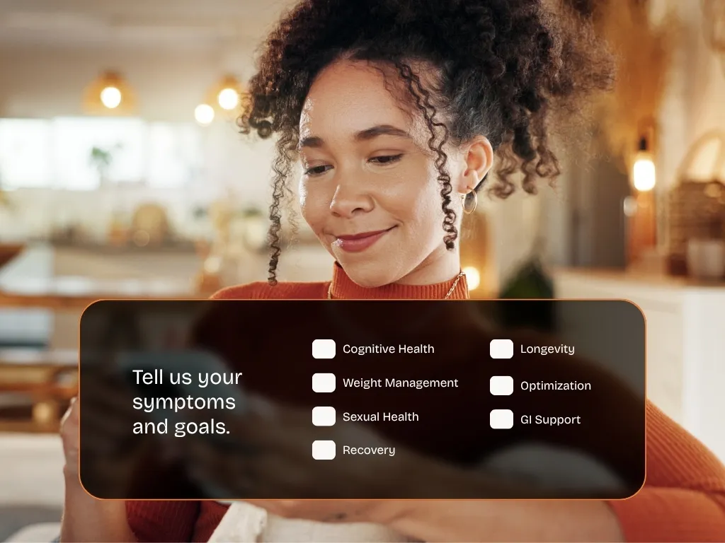 Woman with curly hair completing a symptom intake form during a telehealth session